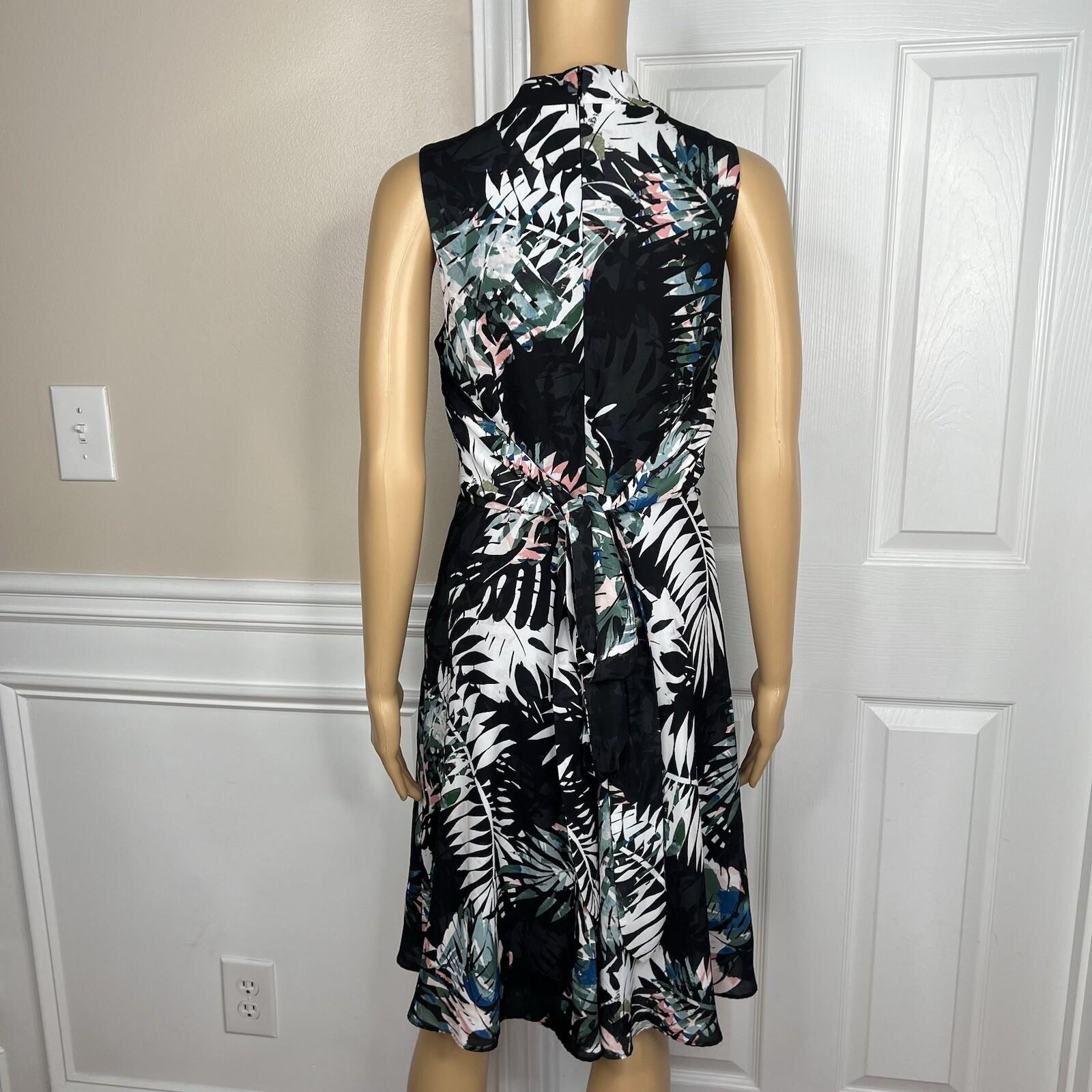10-6481.jpg Tahari ASL Polyester Spandex Dress 2 Floral Sleeveless Belted Fit Flared Pockets