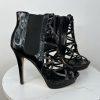 Bebe Patent Leather Booties Size 9M Black Caged  Peep Toe Stiletto Heels Zip