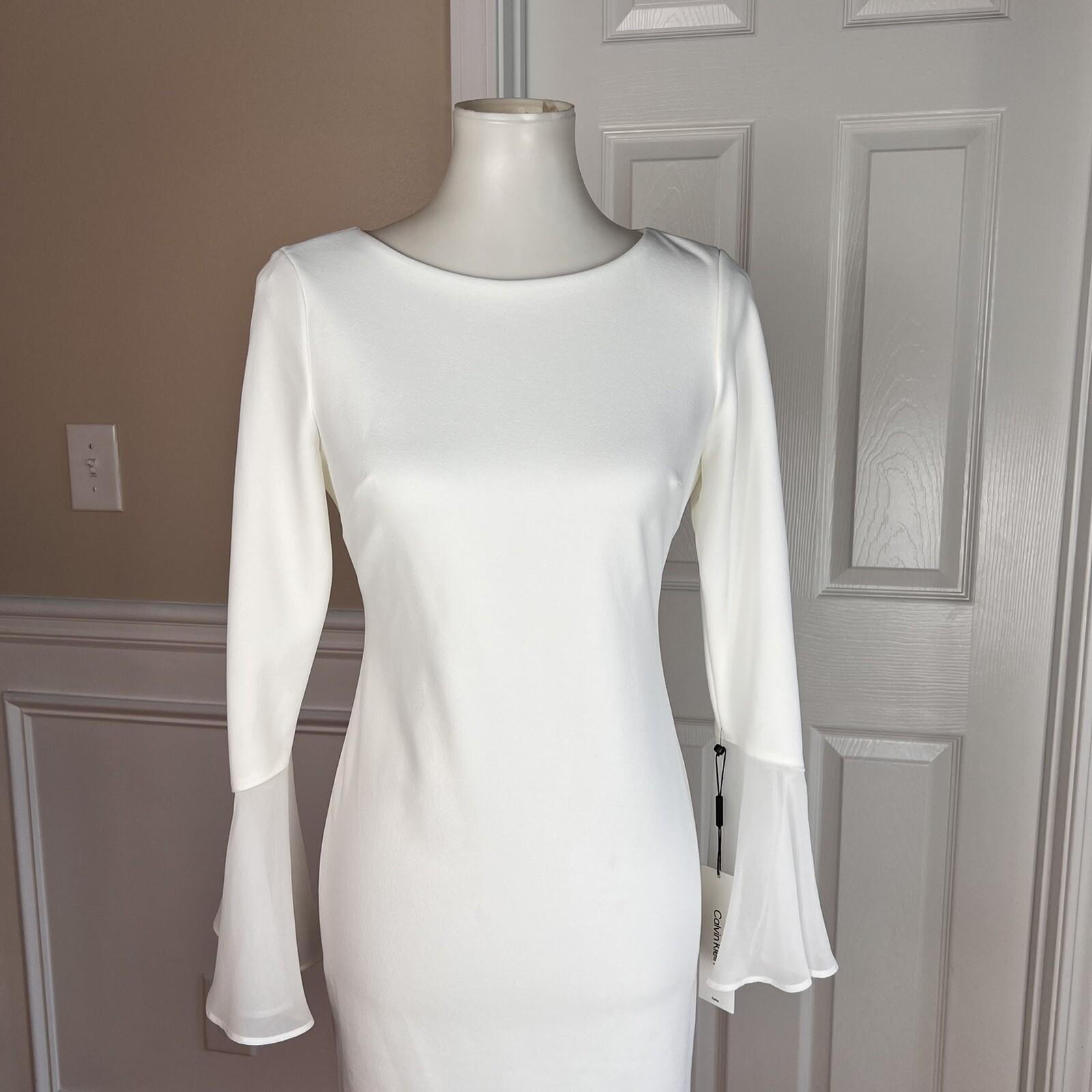 10-8803.jpg New CALVIN KLEIN White Polyester Rayon Spandex Lined Bell Sleeve Dress 6P