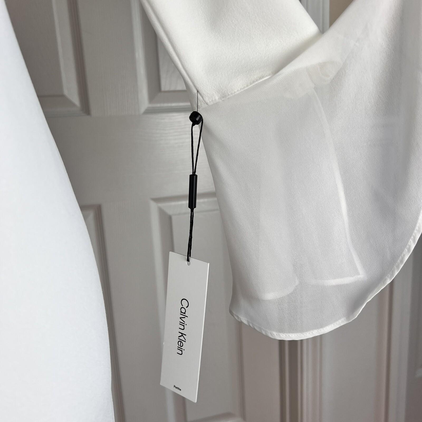 10-8805.jpg New CALVIN KLEIN White Polyester Rayon Spandex Lined Bell Sleeve Dress 6P